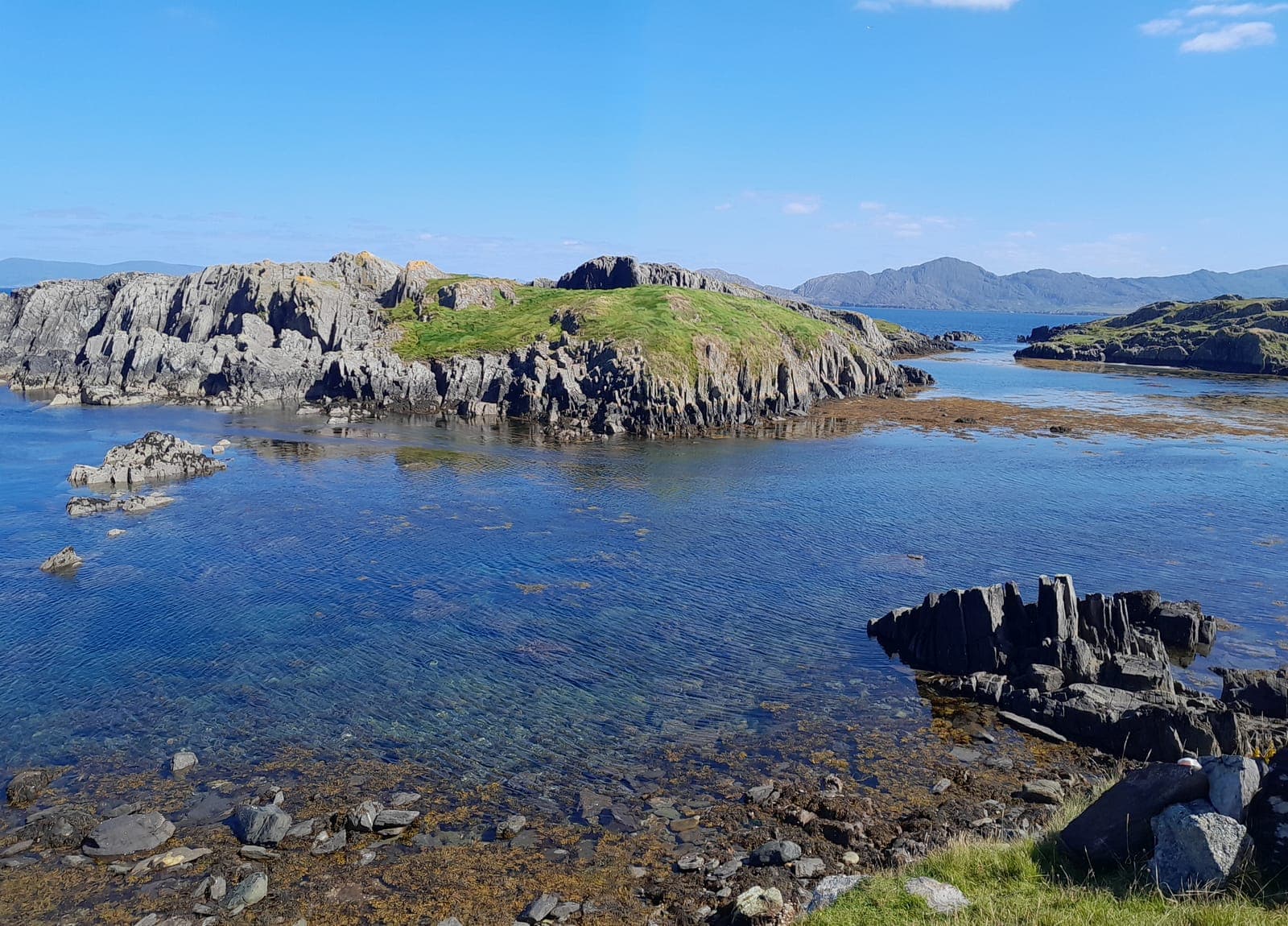 Clear water and rocky islets on the Kerry coast